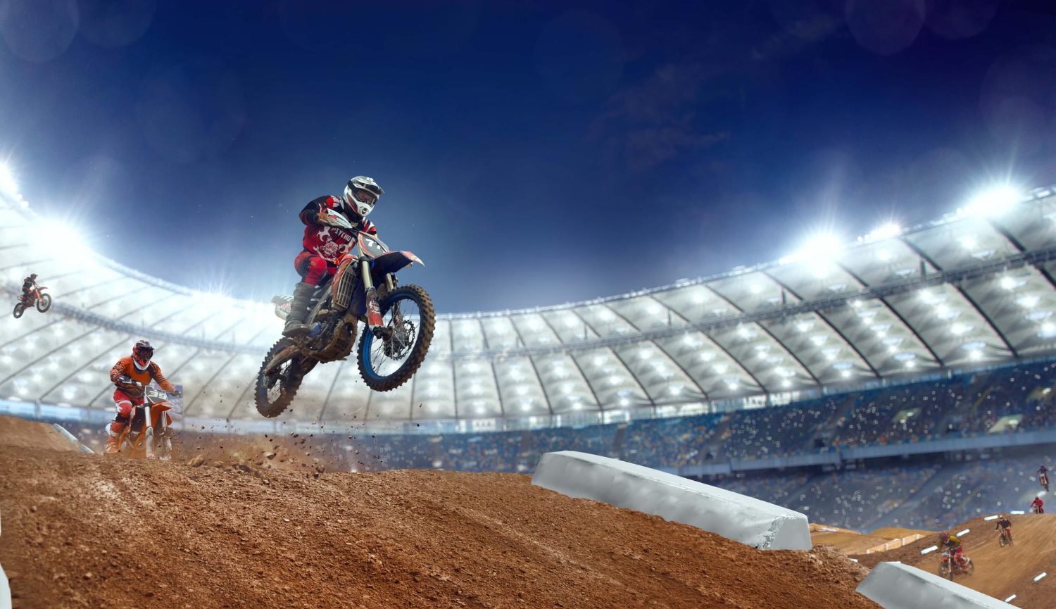 Motocyklista motocrossowy w locie na stadionie